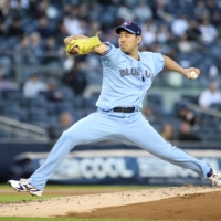 Toronto's Yusei Kikuchi pitches against the Yankees in New York on Tuesday. | USA TODAY / VIA REUTERS