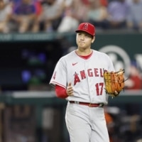 Angels pitcher Shohei Ohtani starts to leave the field after the sixth inning against the Rangers in Arlington, Texas, on Wednesday. | KYODO