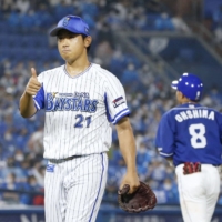 BayStars pitcher Shota Imanaga leaves the mound after recording six scoreless innings against the Dragons in Yokohama on Tuesday. | KYODO