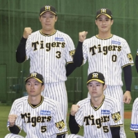 Some of the Hanshin Tigers players voted onto the CL All-Star team via a fan ballot, including Koji Chikamoto (front row, far left), at Koshien Stadium in Nishinomiya, Hyogo Prefecture, on Wednesday | KYODO